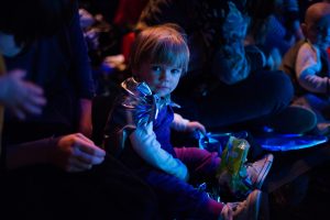 child in audience watching Kaleidoscope. show image