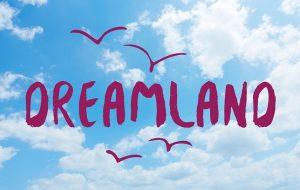Dreamland text over clouds in the sky