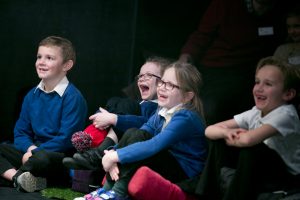 Children watching Bear & Butterfly at The Hullabaloo
