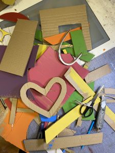 cardboard shapes arranged in a pile